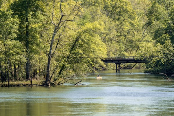 Fishing from yellow kayak on the Catawba