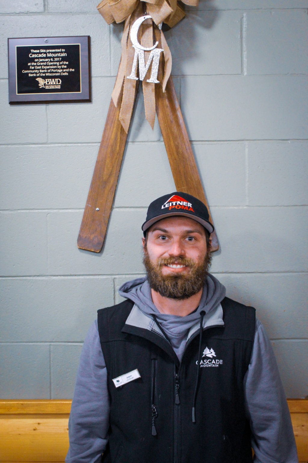 Adam Walz Cascade Mountain Ski resort cafe smiles for camera
