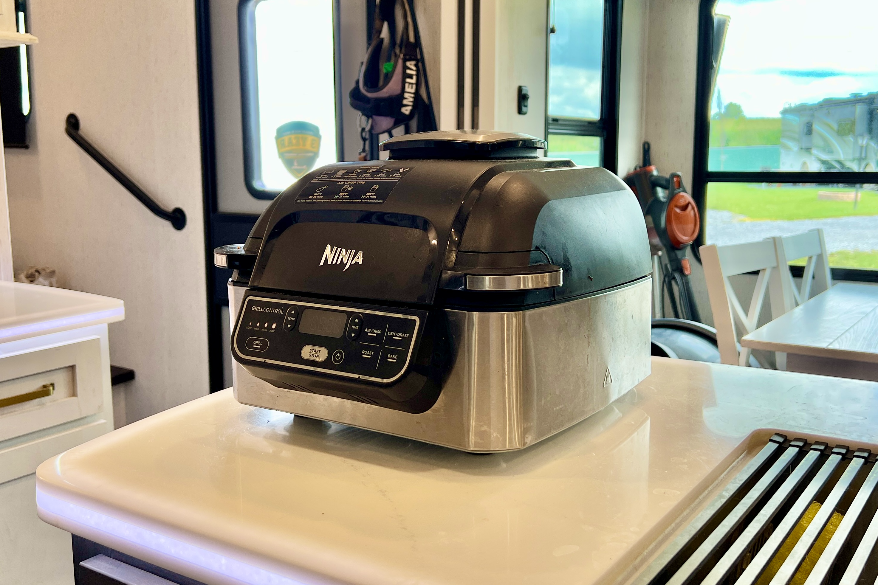 A Ninja Foodi air fryer sitting on the counter of Bailey and Nicole Damberg's Dutchmen Astoria 