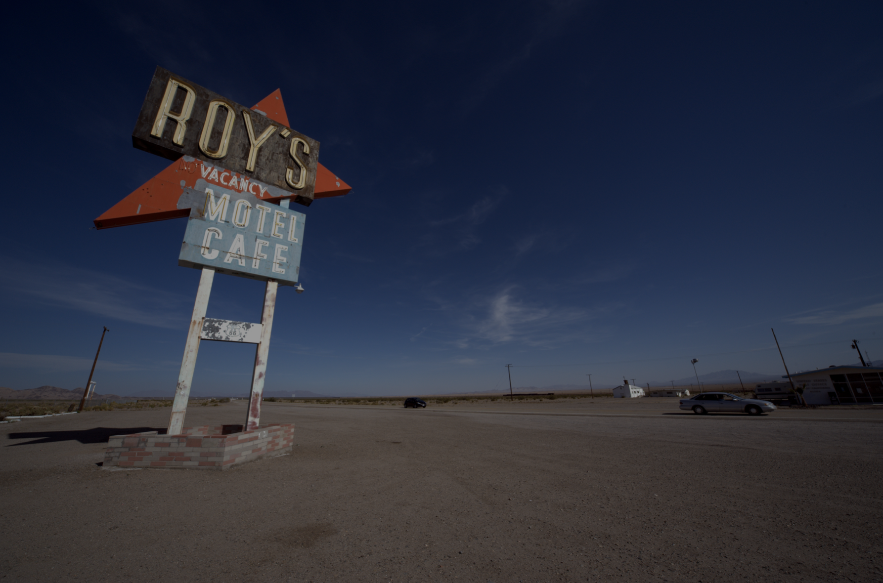 Blue sky with Roy's Motel Cafe sign in Amboy, California
