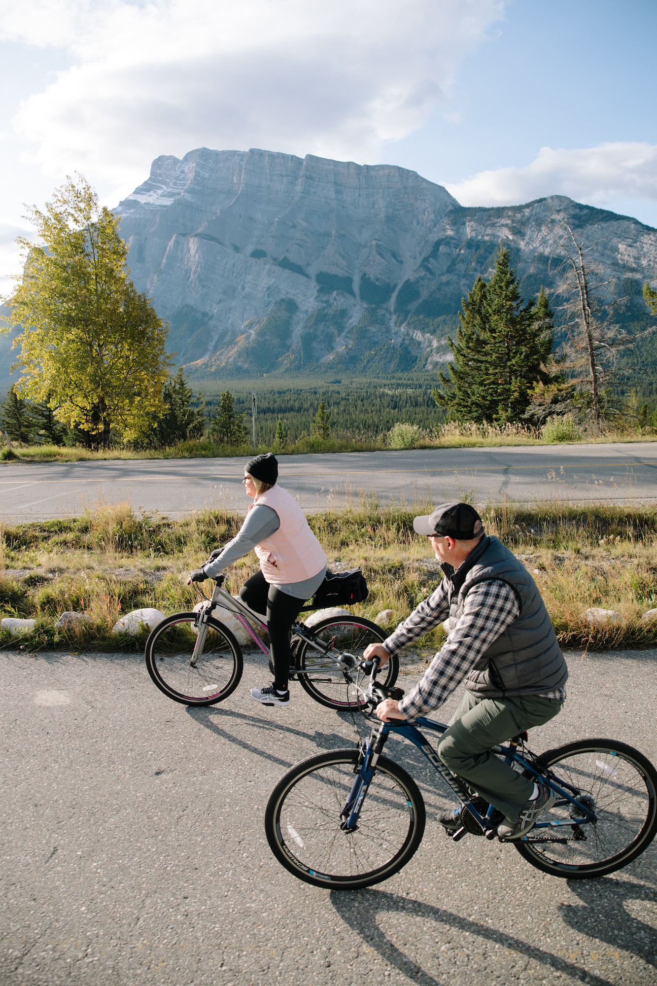 Tina and Craig riding bikes through nature and taking in the views. 