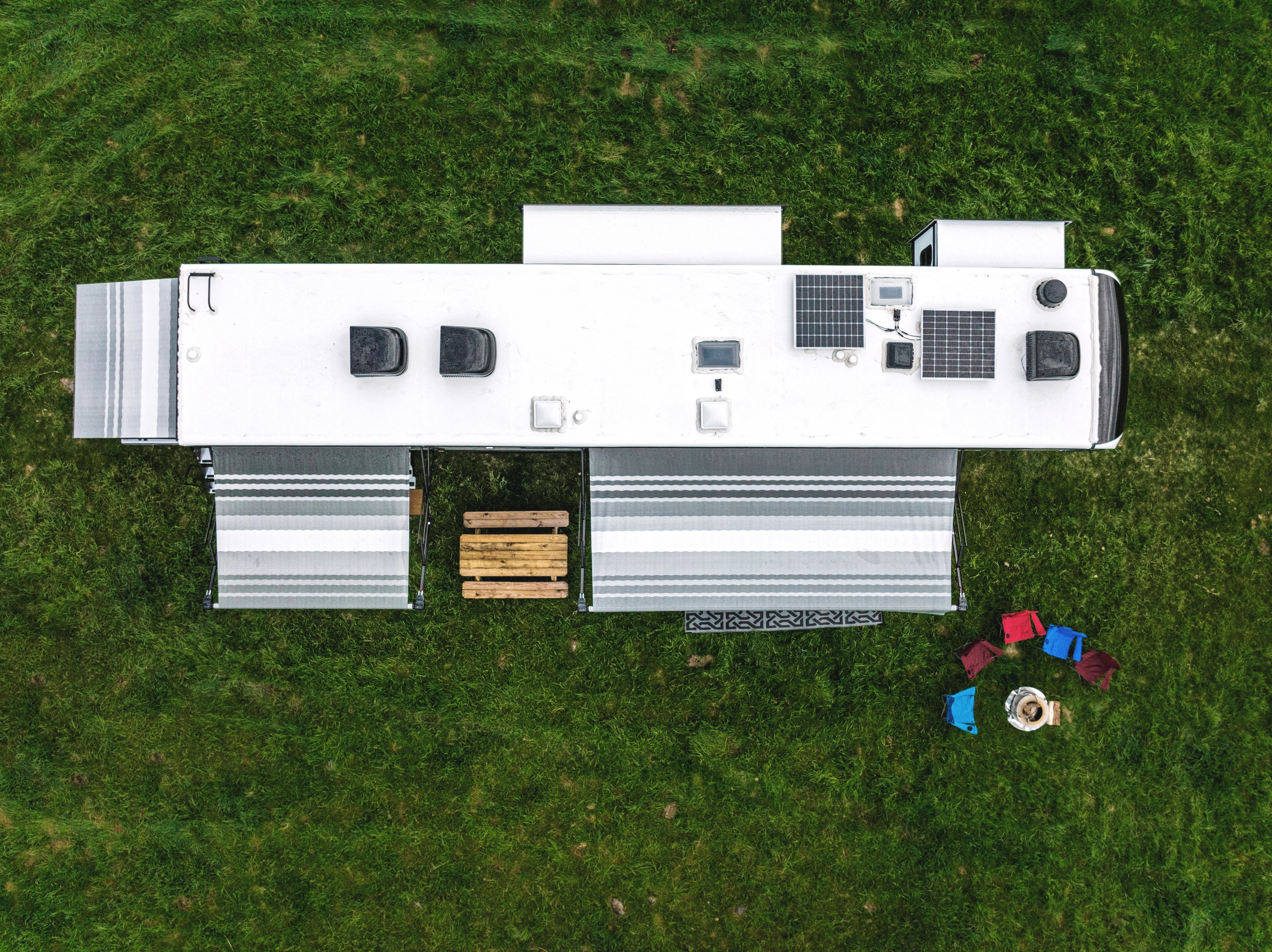 A Keystone Fuzion with solar panels mounted to the roof