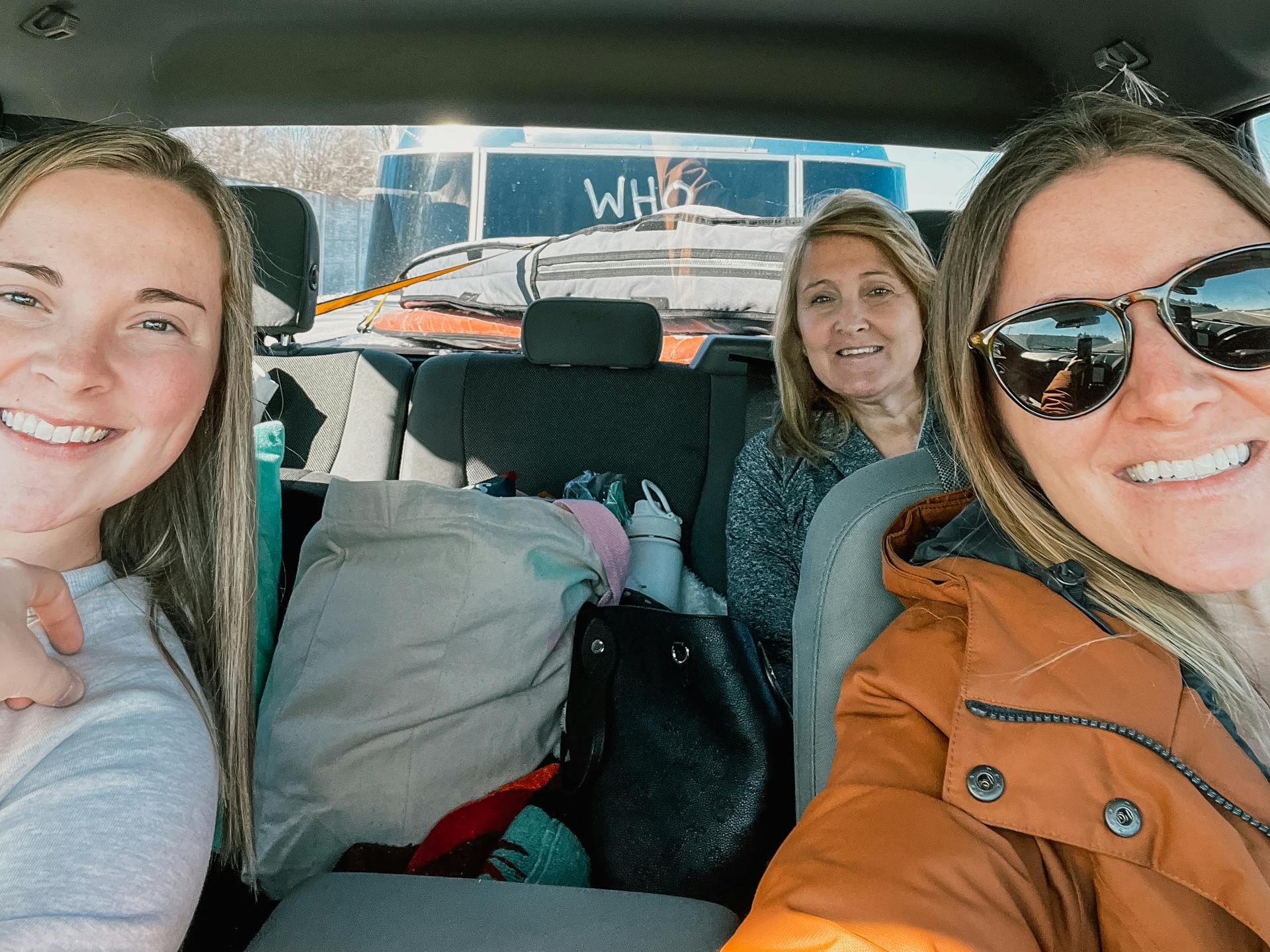 Stacey Powers, her mom and sister all piled in her truck towing her Airstream on the way to the Super Bowl