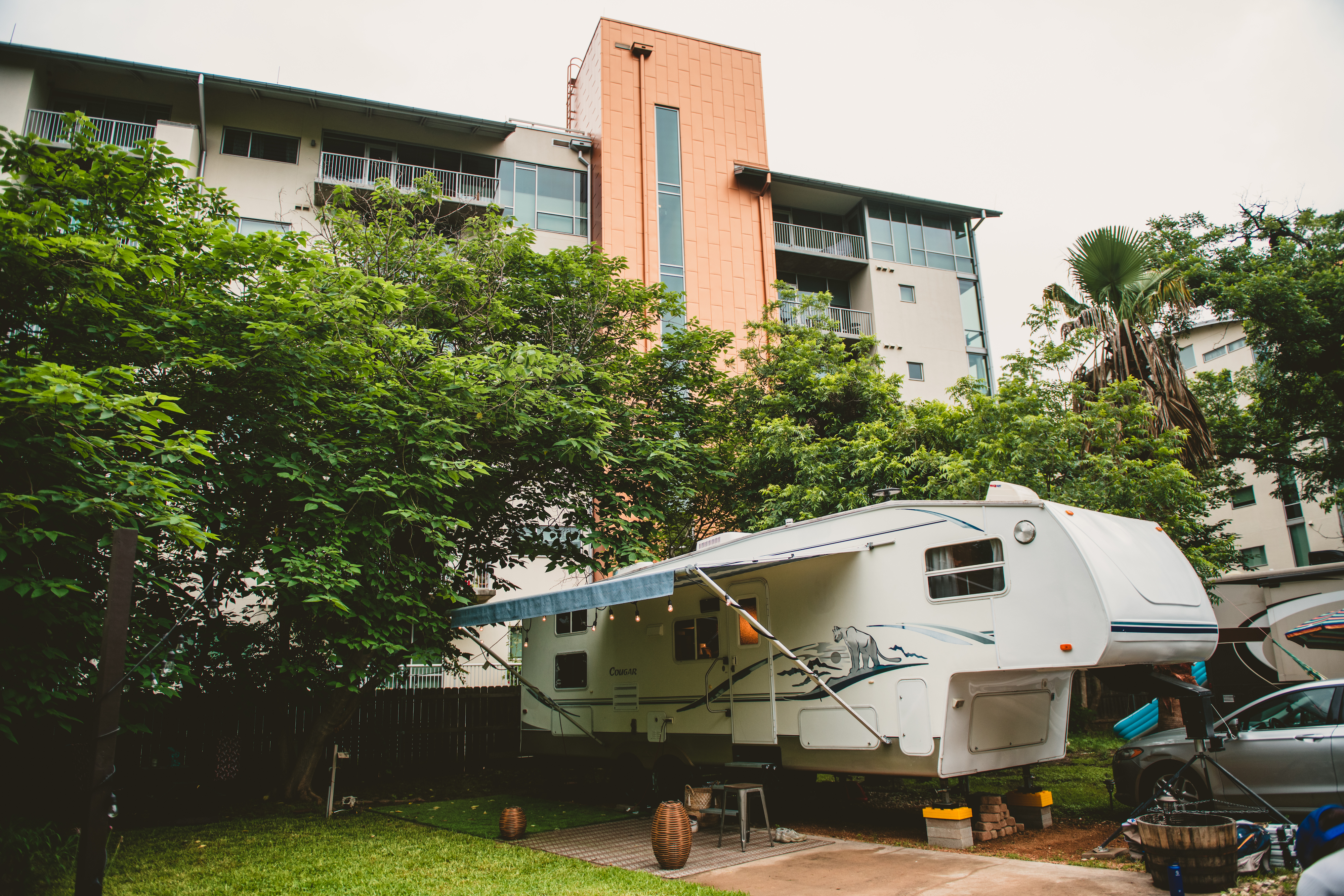 Jessy and Jim's Keystone Cougar parked in a campsite 